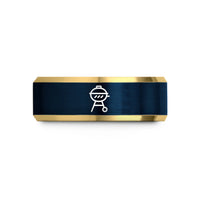 engraved couple rings present – gold & blue tungsten bbq grill wedding band